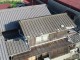 瓦の飛んだ屋根