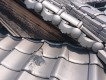 破風が下がって割れた瓦